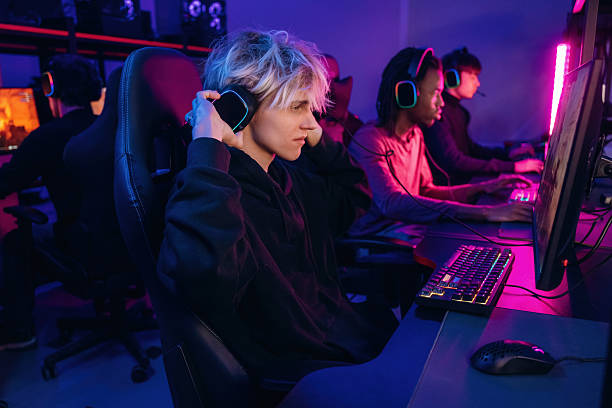 istock High end PC's, side view. Gamers are playing video game by computers 2211900480