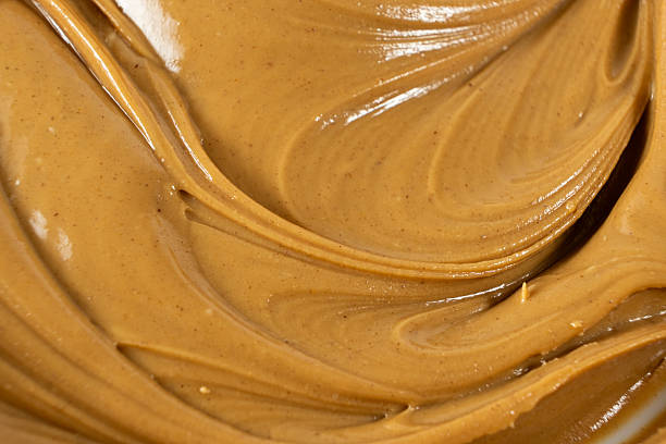 istock Abstract Close-Up of Peanut Butter Texture 2211901126