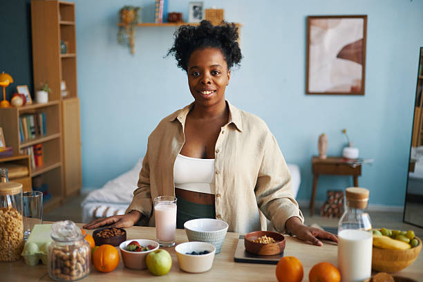 Portrait of Smiling Woman Preparing Healthy Breakfast