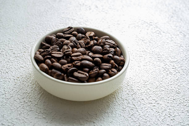 istock moistened and soaked coffee beans 2211904761