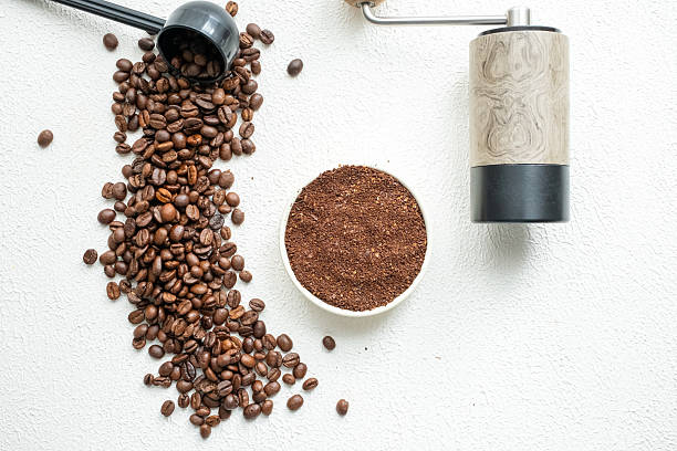 istock coffee beans, a cup of espresso,coffee grinder and ground 2211906249