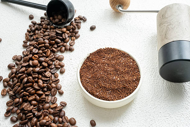 istock coffee beans, a cup of espresso,coffee grinder and ground 2211906252