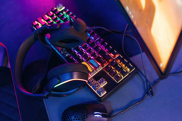 istock Gaming computer is in the dark room with neon lighting 2211906309