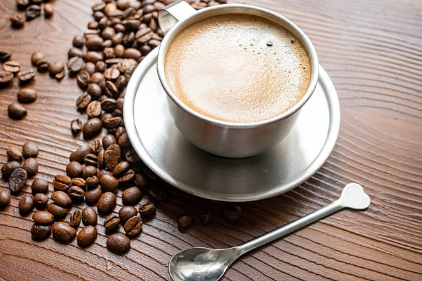 istock coffee beans, a cup of espresso and ground coffee 2211909035