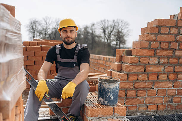 istock Construction worker is at job with bricks outdoors 2211912931
