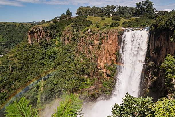 istock Howick Falls with Rainbow and Lush Greenery 2211913575