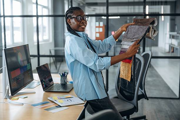 istock Designer is working in the office 2211914078