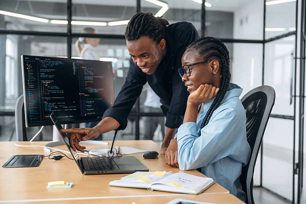 istock Side view, sitting. Business people are working in the office 2211914232
