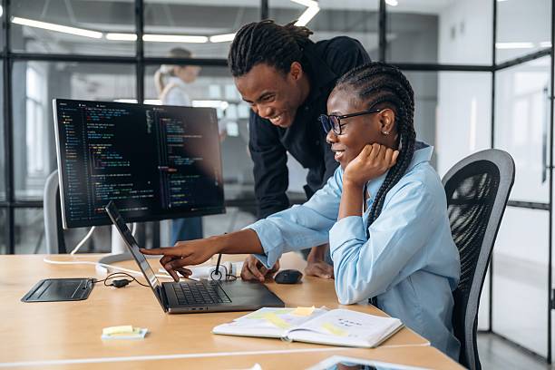 istock Side view, sitting. Business people are working in the office 2211914241