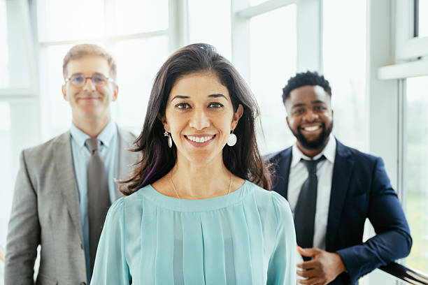 istock Multicultural corporate business people working in modern bright office with high windows 2211915126