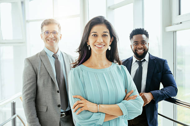 istock Multicultural corporate business people working in modern bright office with high windows 2211915130