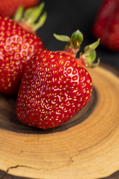 istock several red sweet strawberries in close-up 2211915526