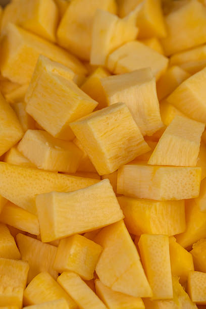 istock orange pumpkin fruit details cut into pieces for cooking 2211915572