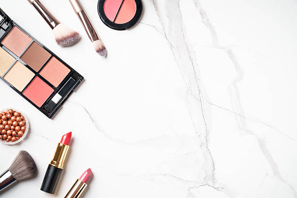 istock Make up products at white marble background. 2211916090
