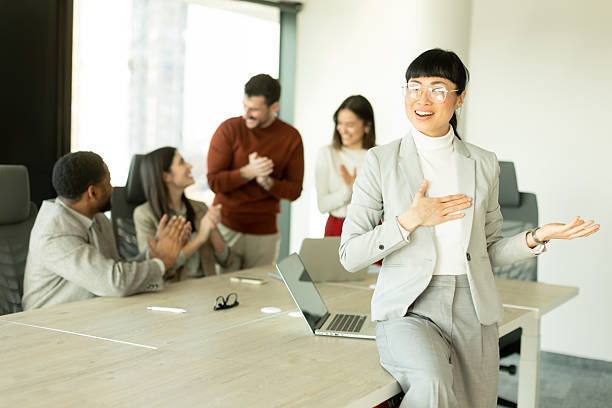 istock Business professionals collaborate in a modern office setting during a productive meeting session 2211917905