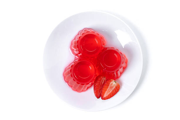 Fresh strawberry jelly isolated on white background