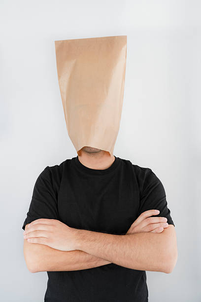 Man wearing a paper bag.