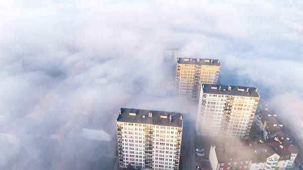 istock Tarnow Urban Landscape at Dusk, Surrounded by Heavy Mist 2211922740