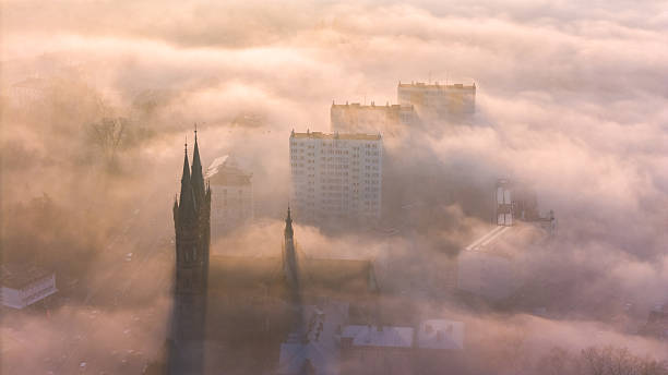 istock Tarnow Urban Landscape at Dusk, Surrounded by Heavy Mist 2211926723