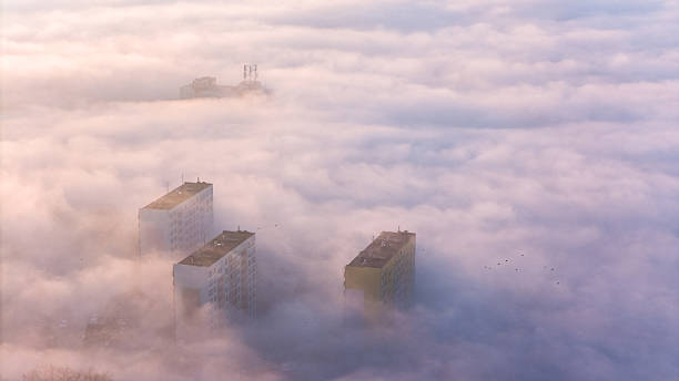 istock Tarnow Urban Landscape at Dusk, Surrounded by Heavy Mist 2211926849