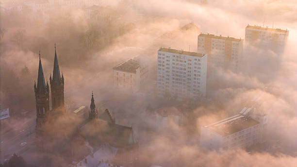 istock Tarnow Urban Landscape at Dusk, Surrounded by Heavy Mist 2211928099