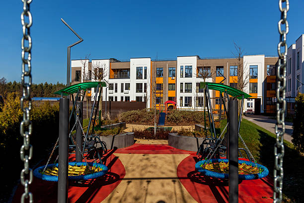 istock Modern playground in residential complex courtyard 2211929826