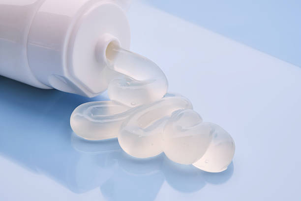 istock Gel toothpaste in a tube on a blue background. 2211930213