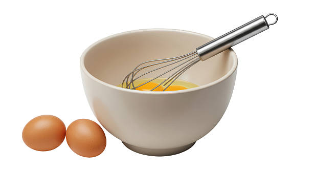 istock Isolated Bowl with Eggs and Whisk Cooking Preparation 2211941266