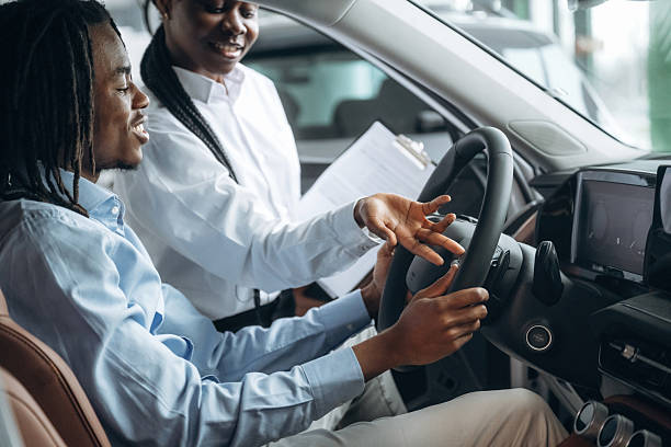 istock Man and woman are in the automobile 2211942012