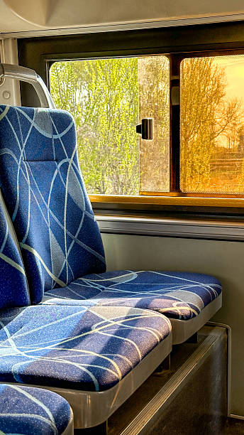 istock Blue passenger chairs in public bus 2211942358