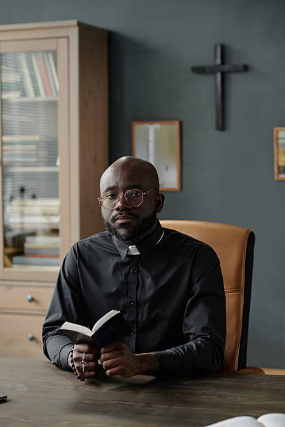 istock Portrait of Pastor with Bible 2211943367
