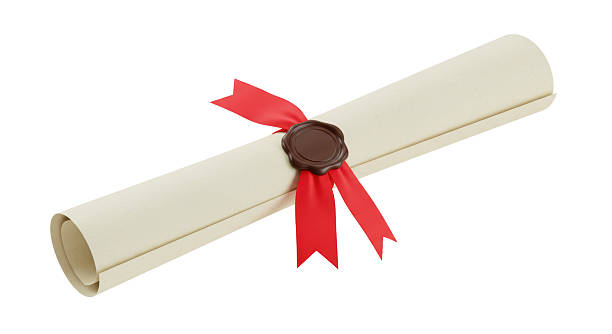 Solemn diploma of the graduate about the completion of studies with a red ribbon on a white background.