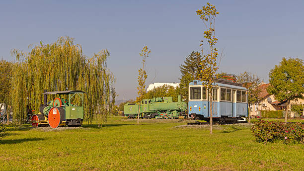 Slavonski Brod, Croatia - October 22, 2024: Steam Machine Locomotive Old Tram at Tourist Industrial Park Djuro Djakovic Open Air Museum Sunny Autumn Day.