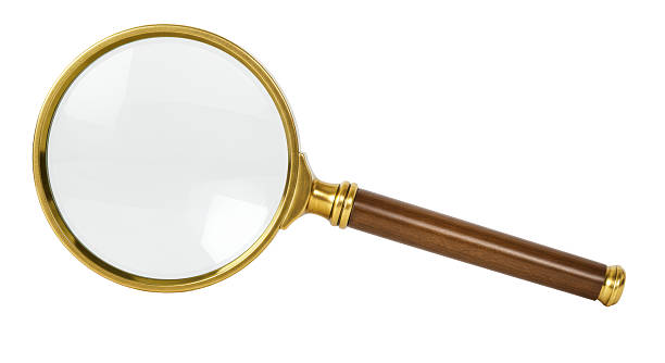 istock Isolated Magnifying Glass with Wooden Handle 2211945500