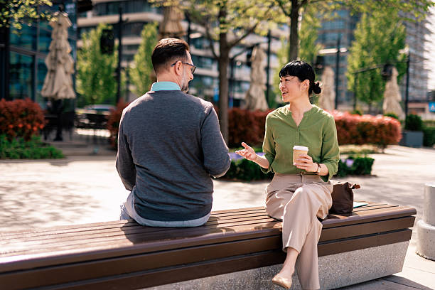 istock Business partners having a conversation during their coffee break 2211946474