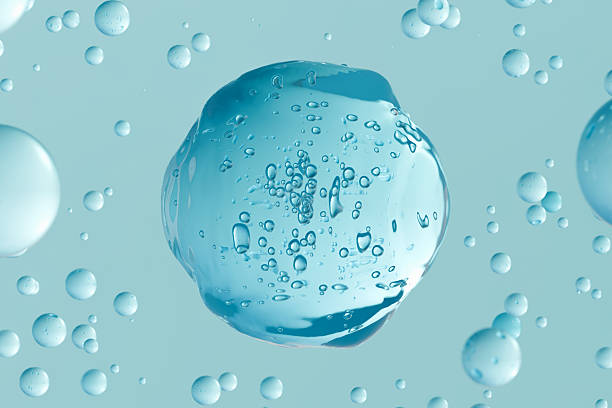 Blue transparent gel drop with air bubbles on aqua background. Abstract cosmetic texture, skincare serum or hyaluronic acid concept. Clean, minimal design for beauty and wellness themes.