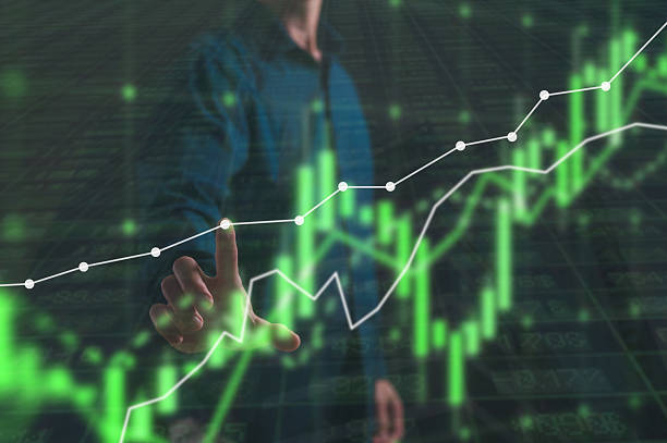 istock Businessman analysing trading  up trend line graph in bull market, Digital analytics data visualization, financial schedule Currency and Exchange Stock Chart for Finance and Economy Display 2211946763