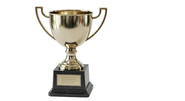 istock Isolated Golden Trophy Cup on Marble Base 2211950765
