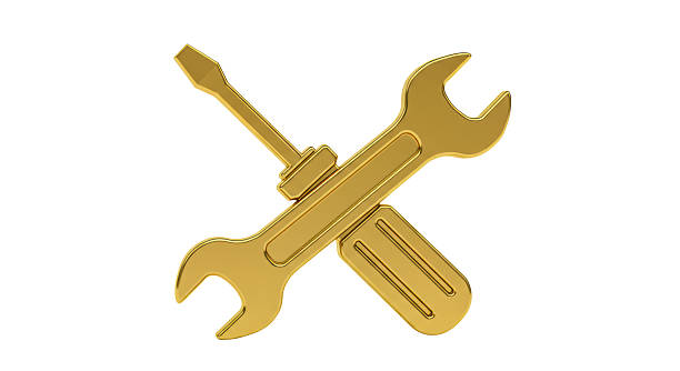 istock Isolated Golden Wrench and Screwdriver Tools 2211950840