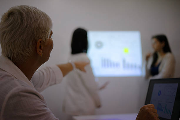 istock White collar workers are meeting at office. 2211951154