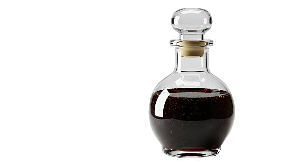 Isolated Vintage Glass Bottle with Dark Liquid