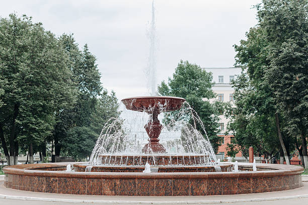 istock fountain in city square 2211952834