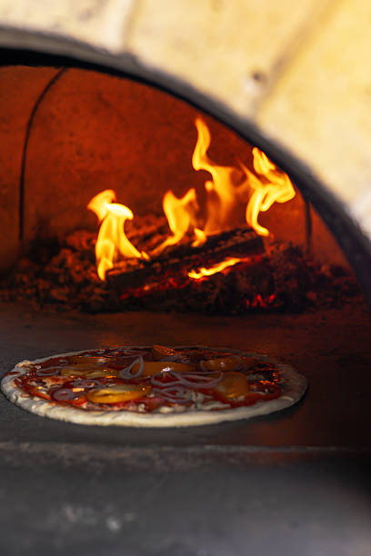 istock The cook prepares pizza in the kitchen 2211954294