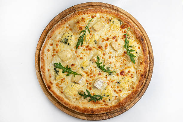 istock pizza with 4 cheeses on a white background 2211954741