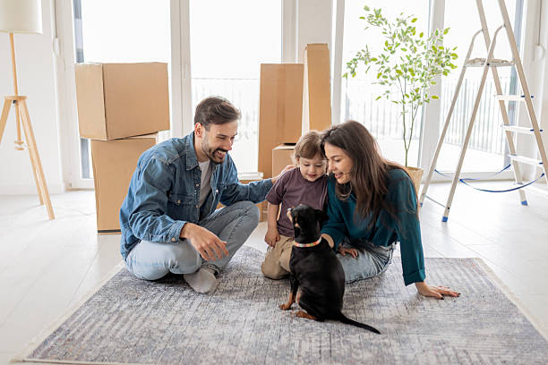 istock Family of Four with Packed Boxes 2211955718