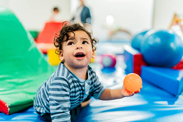 istock Baby boy playing at playroom 2211957325