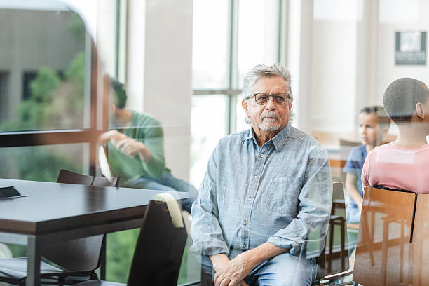 istock Mature Man in Group Therapy Session, Mental Health Support 2211963592