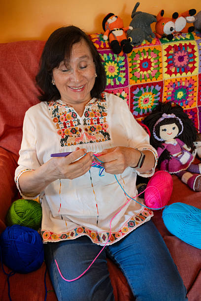 istock Cozy Knitting Time with Handmade Dolls and Blankets 2211968996