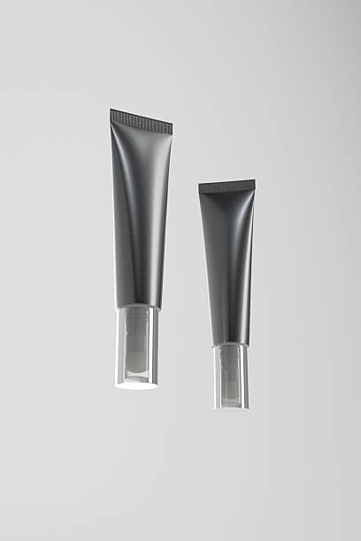istock makeup squeeze tube packaging, cosmetic tube with sponge applicator, luxury liquid concealer container, liquid blush floak sponge packaging, lip gloss tubular container, black plastic eye cream tube 2211969376