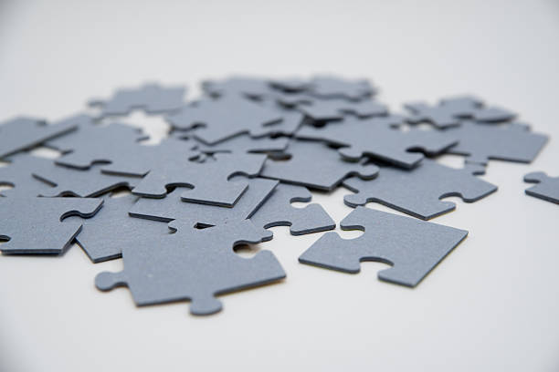 monochromatic puzzles in a pile lying on a white background
